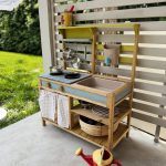 a diy outdoor mud kitchen makeover